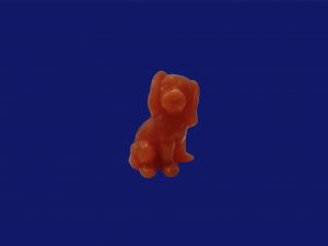 Figurita perro naranja