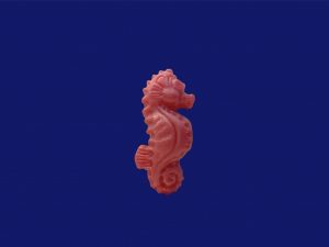 Figurita caballito de mar rosa