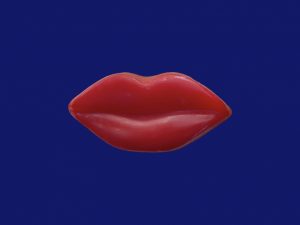 Figurita labios rojos