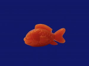 Figurita pez naranja