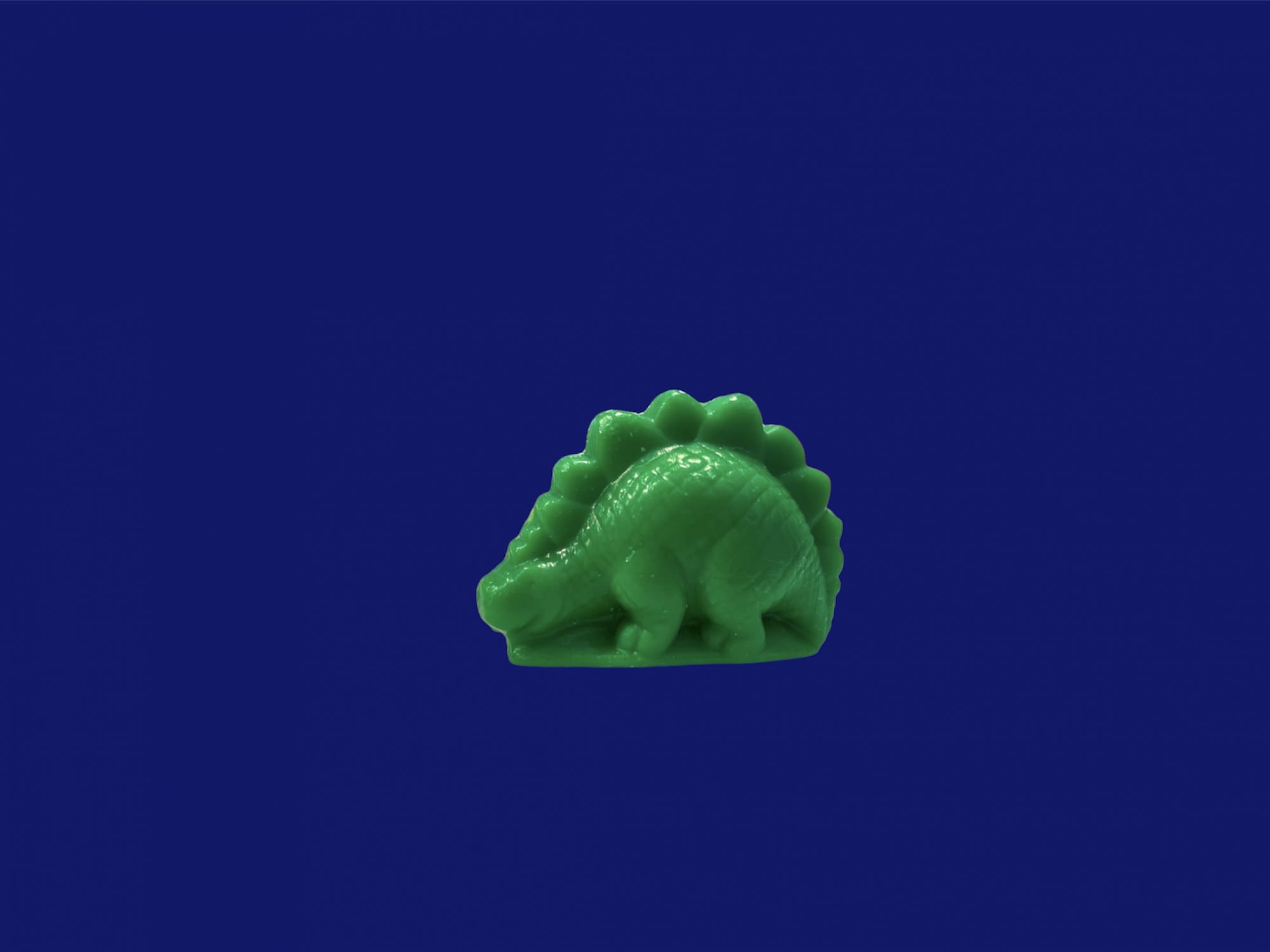 Figurita dinosaurio verde