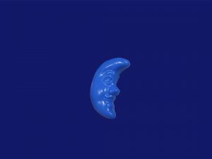 Figurita media luna con cara azul